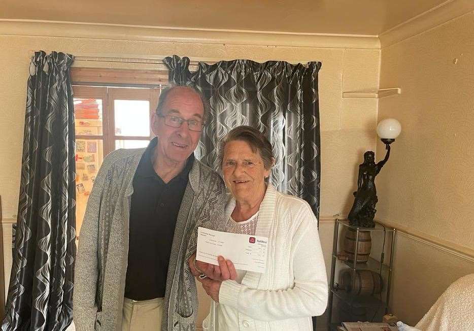 Mr and Mrs Ralph with their £100 donation slip