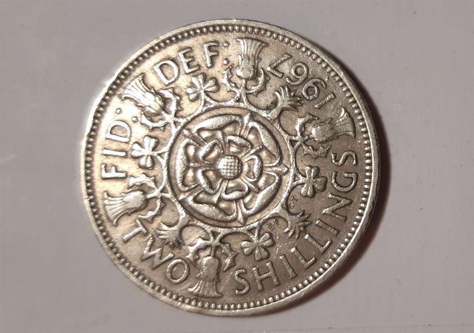 Two shillings. The last pre-decimal coins were minted in 1967