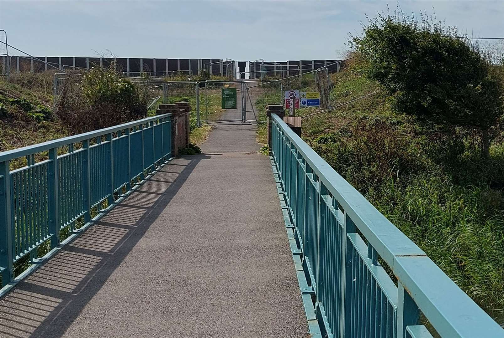 The path has been blocked off between the seafront and the bridge over Royal Military Canal, which leads to the footpath. Picture: Nicki Stuart