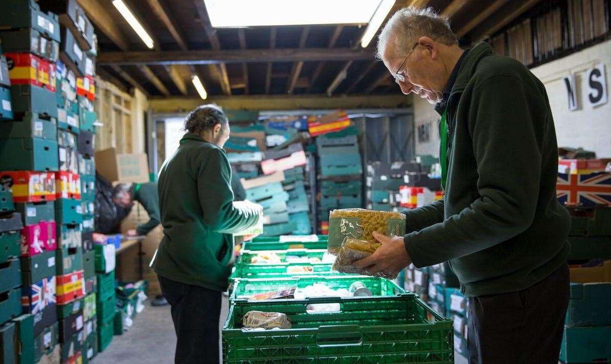 Foodbanks in Maidstone are receiving additional support from Maidstone Borough Council Stock pic of The Trussell Trust volunteer