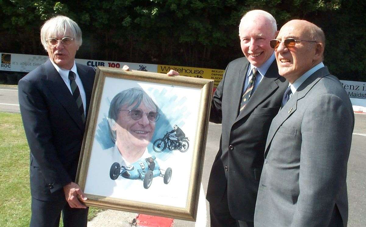 Ecclestone was presented with a picture during the opening of the new clubhouse in 2003