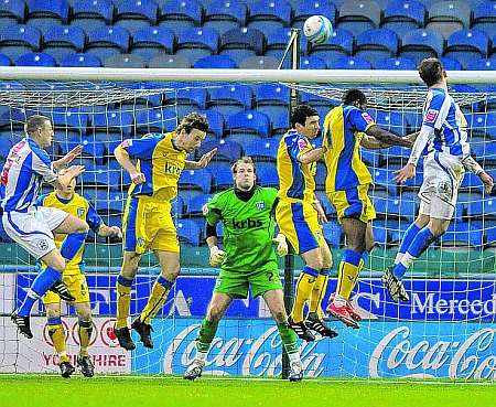 Jordan Rhodes scores Huddersfield's winning goal. Picture: Barry Goodwin