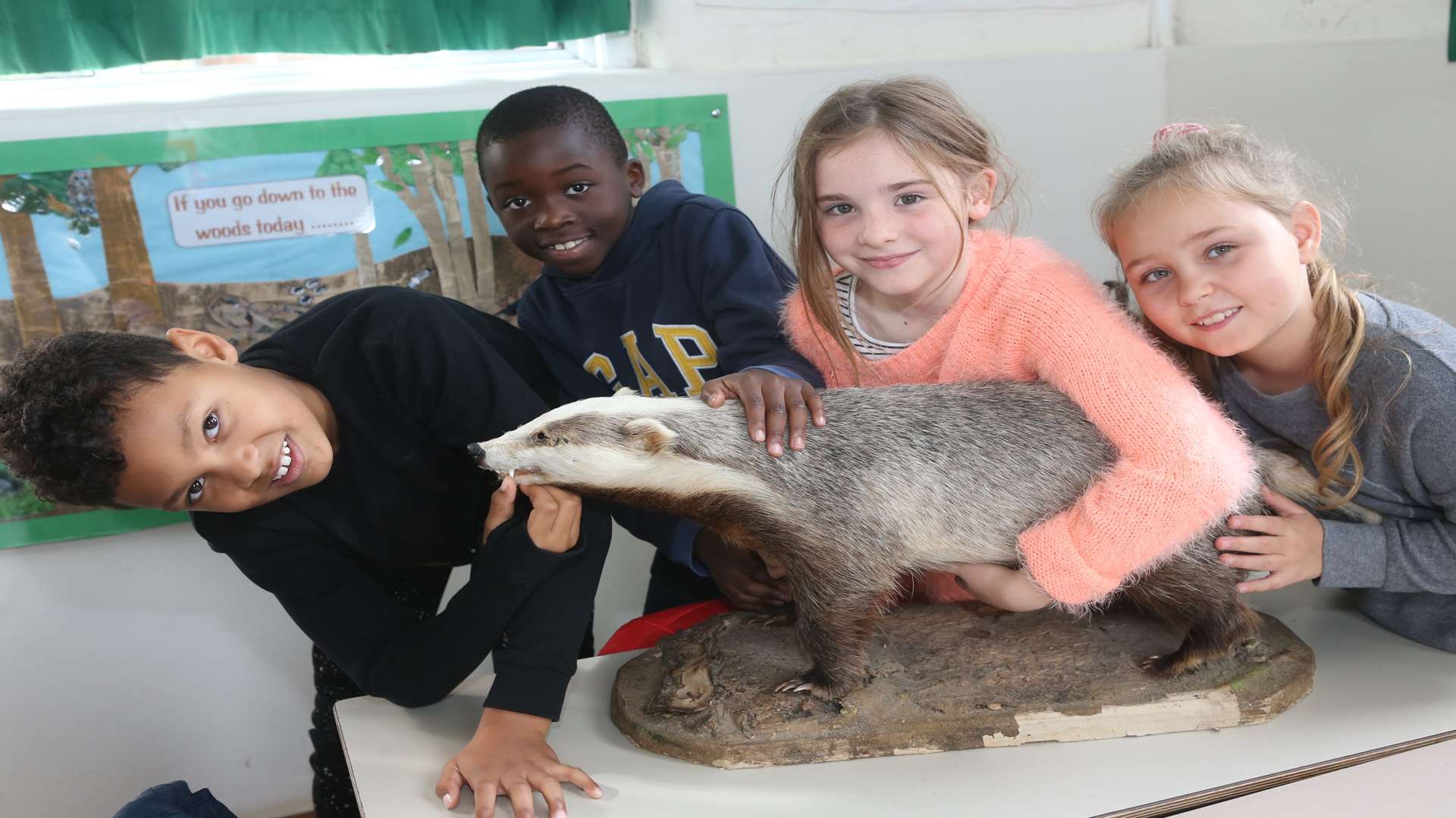 L/R: Kieron, nine, Tumininu, eight, Hannah, eight and Kiedis, nine, with a stuffed badger.