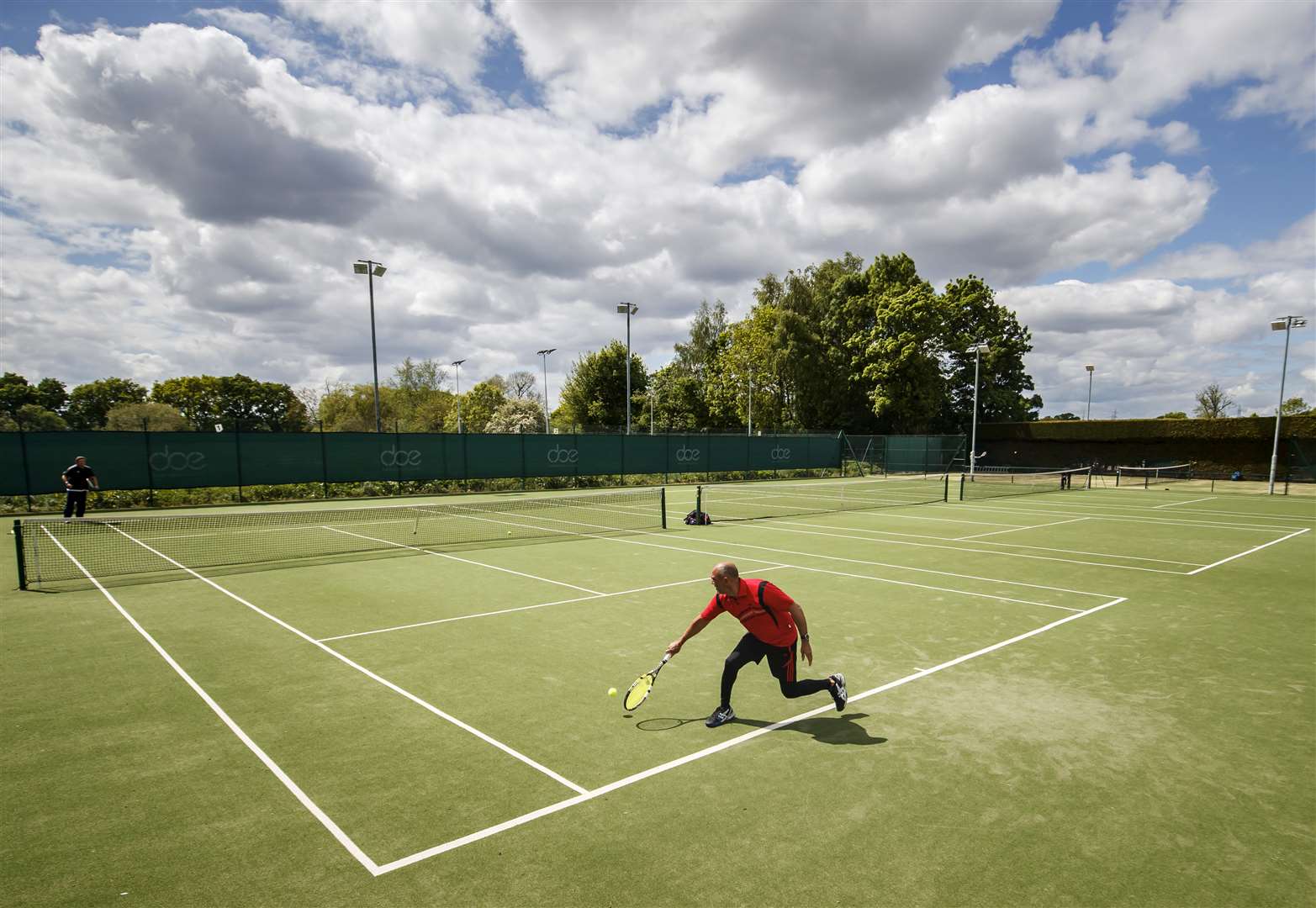People play tennis at York Tennis Club as some lockdown restrictions on leisure activities were released (PA)