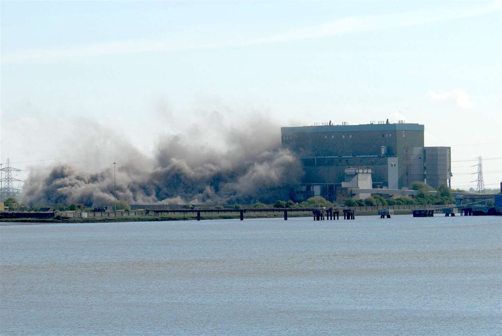 Smoke and dust rising from the power station in Essex during another demolition earlier this year, Picture: Fraser Gray (5993753)