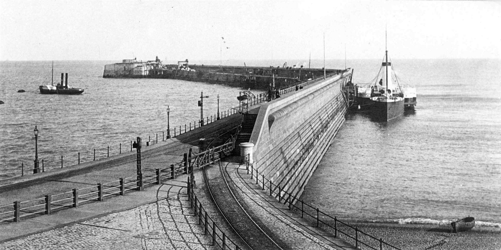 The Admiralty Pier in 1895 with a paddle boat alongside before a planned extension