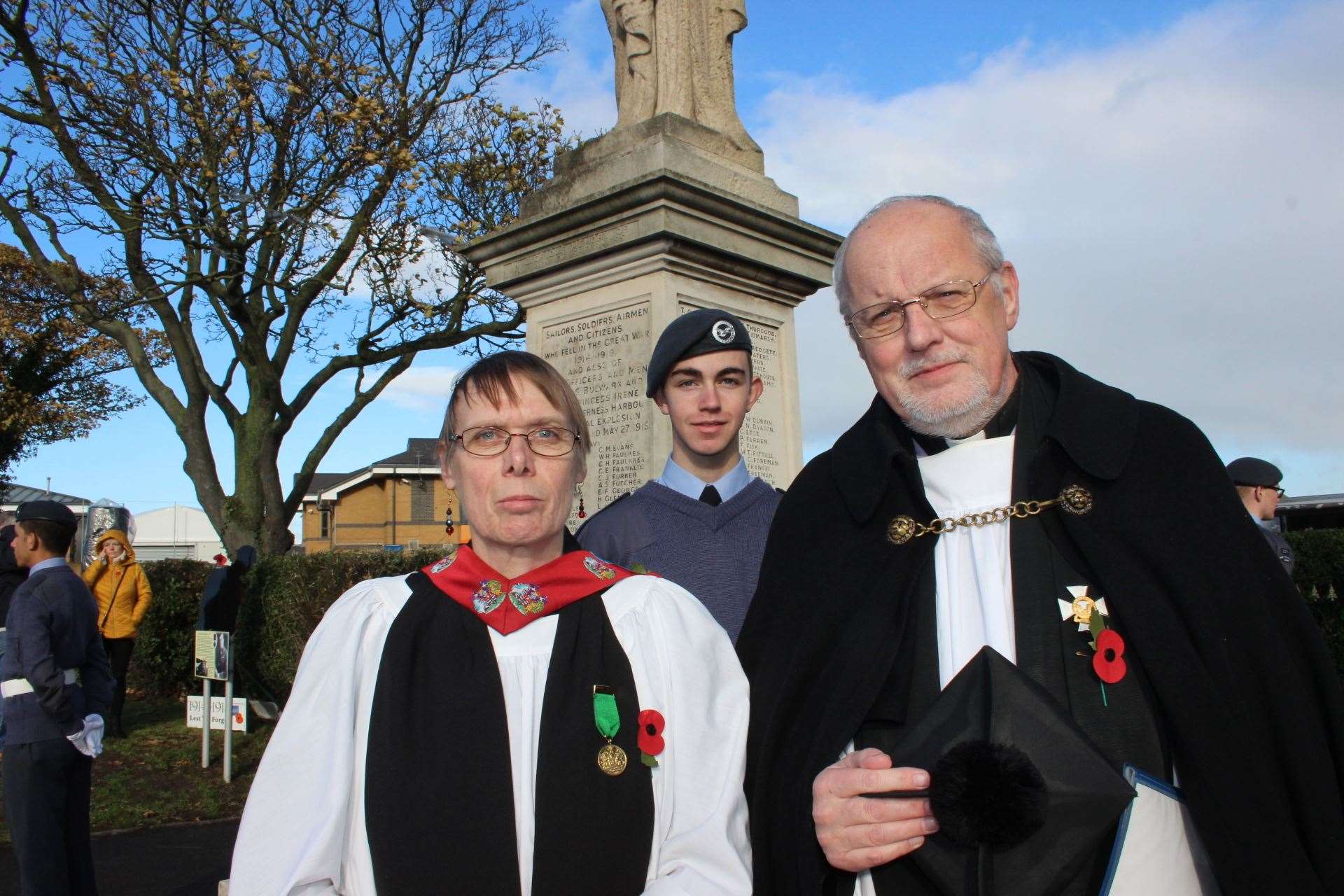 Town chaplain the Rev Jeanette McLaren and the Rev Colin Johnson at Sheerness war memorial with cadet Callum Spandley