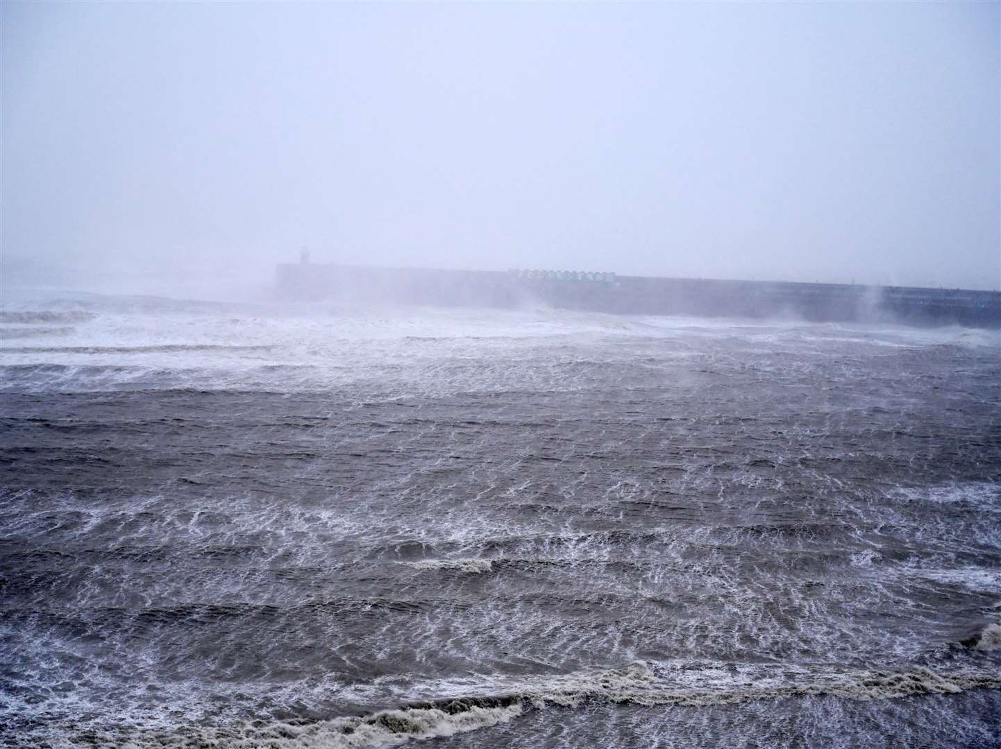 Huge waves were seen at Folkestone harbour arm yesterday, with more expected tomorrow. Picture: Barry Goodwin