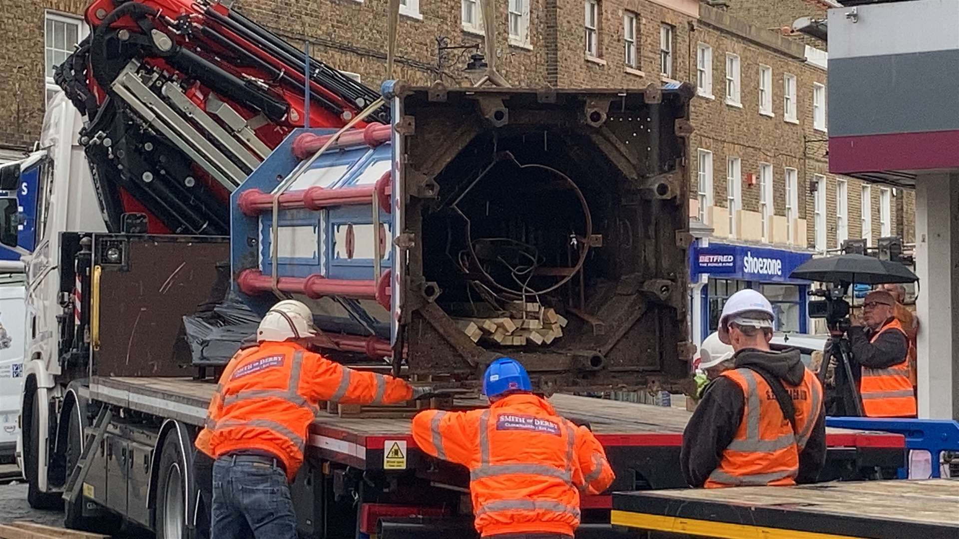Day Four: The column section of the Sheerness clock tower is craned onto a lorry ready to be taken away for restoration