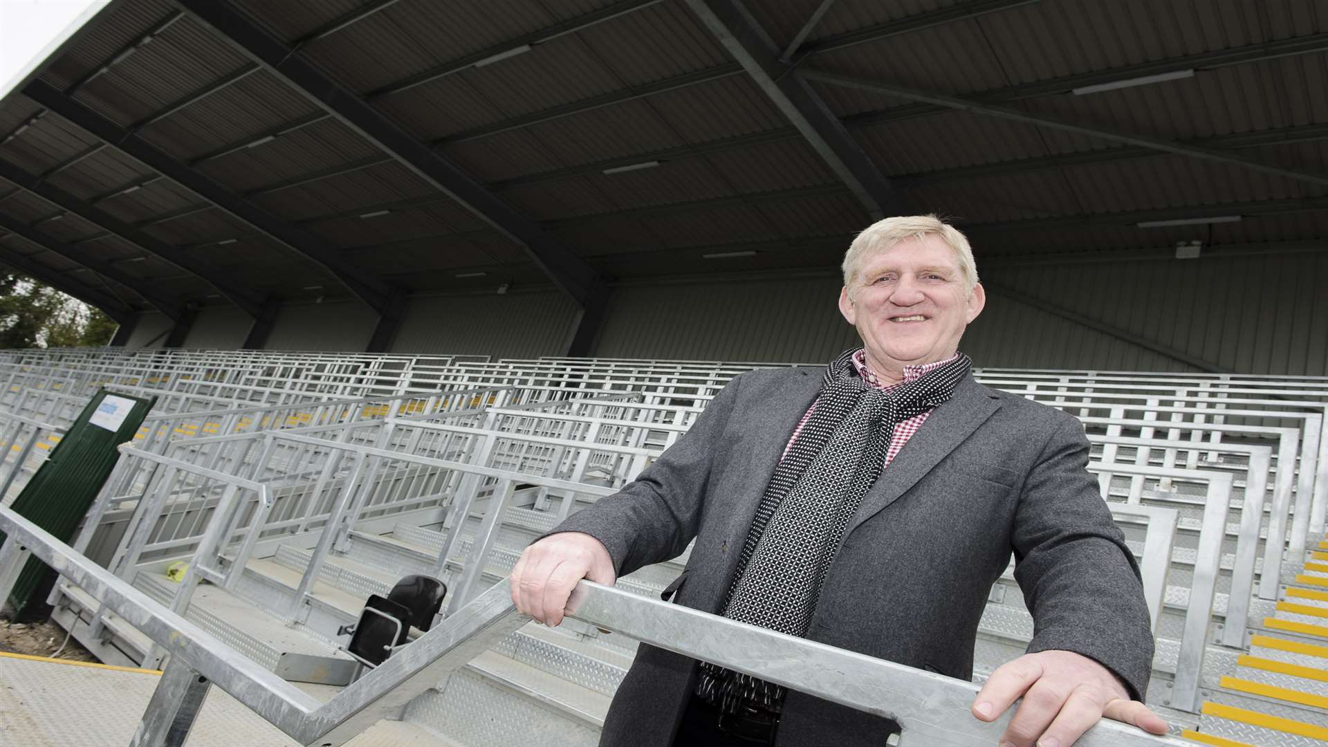 Maidstone co-owner Terry Casey in the new stand Picture: Andy Payton