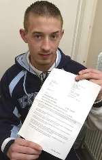 RELIEF: Kurt Walker with the letter telling him the good news. Picture: GERRY WHITTAKER
