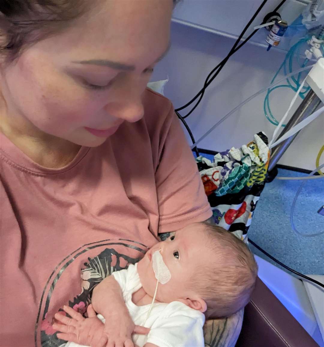 Darcy and Natalie enjoy a cuddle in hospital