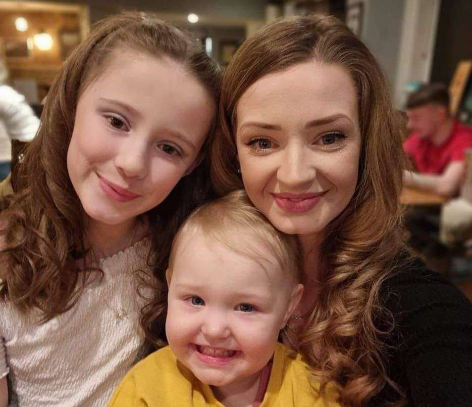 Tiff Smith, with daughters Millie, nine, and Lily, two