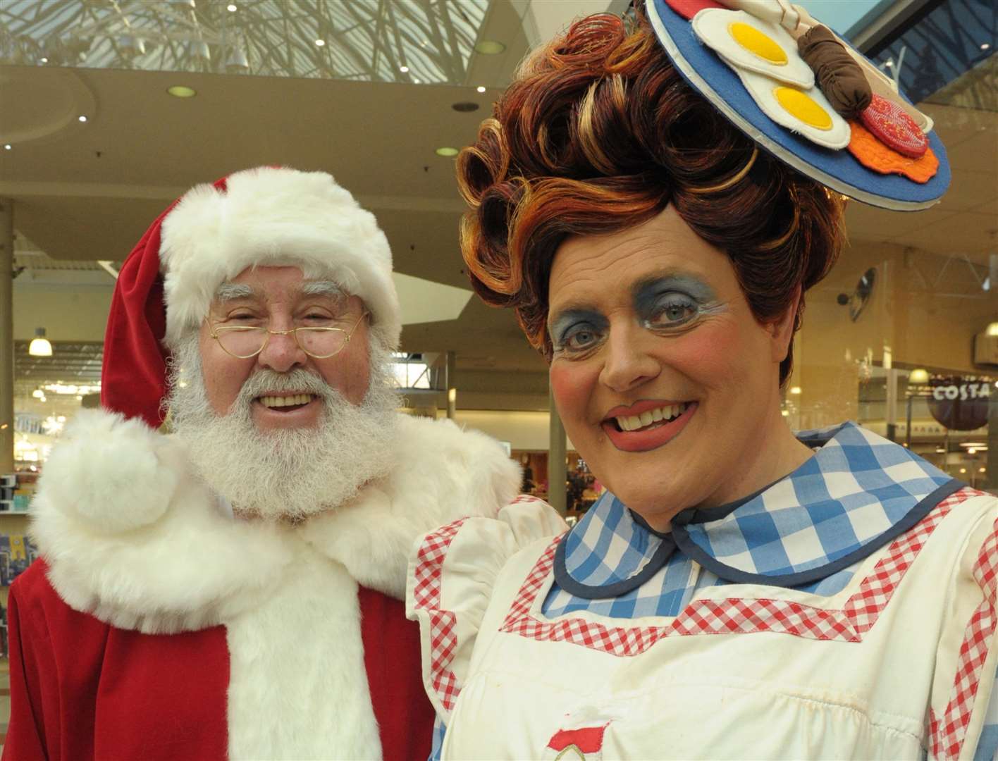 Panto dame Ian Good with Santa at the Hempstead Valley Shopping Centre grotto Picture: Steve Crispe