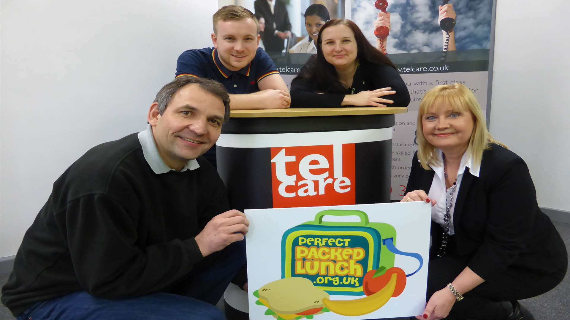 David and Lisa Settle (front) with Matt Ward and Rebecca Garcia, all of Telcare Ltd, announce company's support for the Perfect Packed Lunch Awards 2015.