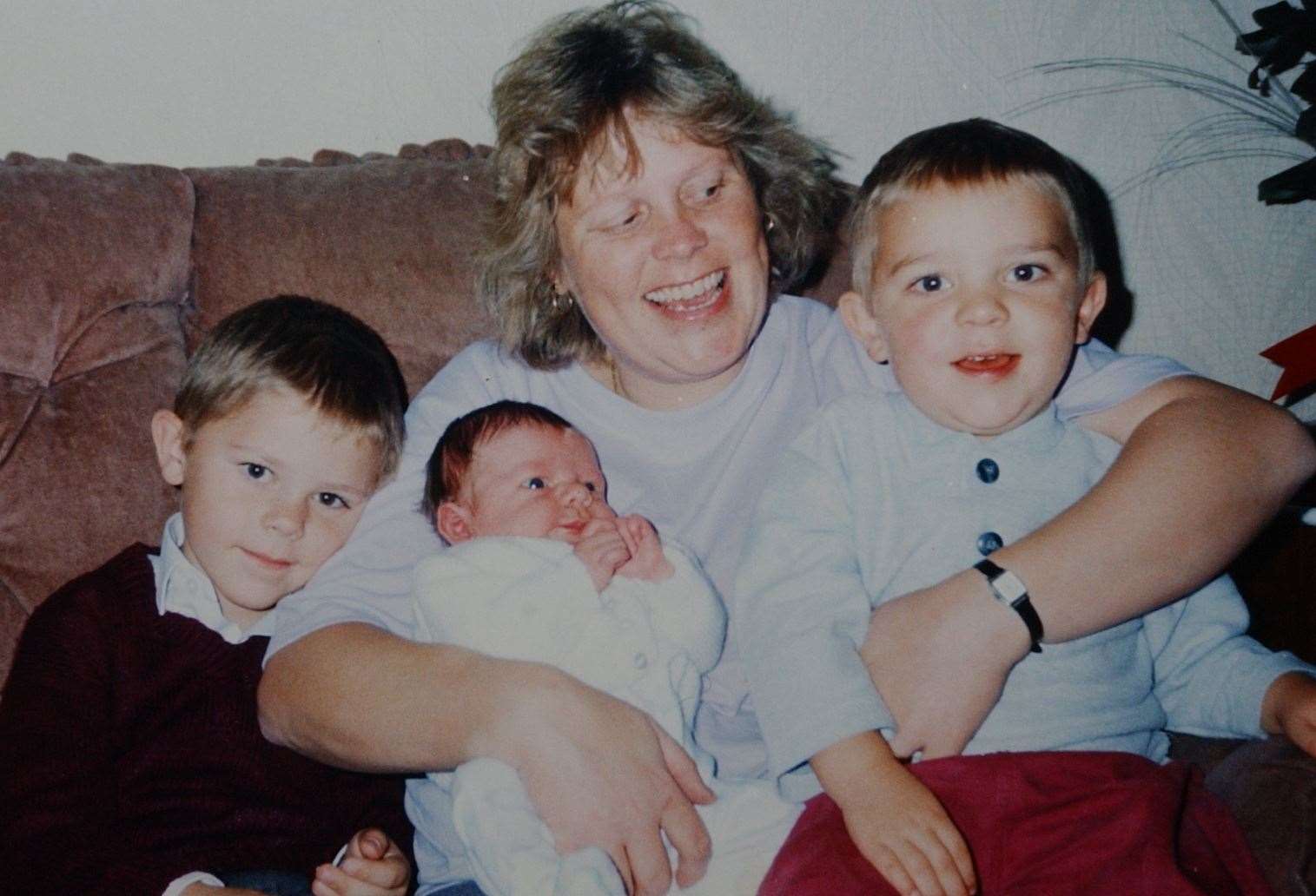 Debbie Griggs with her children, Jeremy, Jake and baby Luke. Picture: Mike Waterman