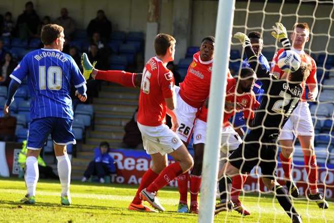 Amine Linganzi heads home against Crewe. Picture: Barry Goodwin