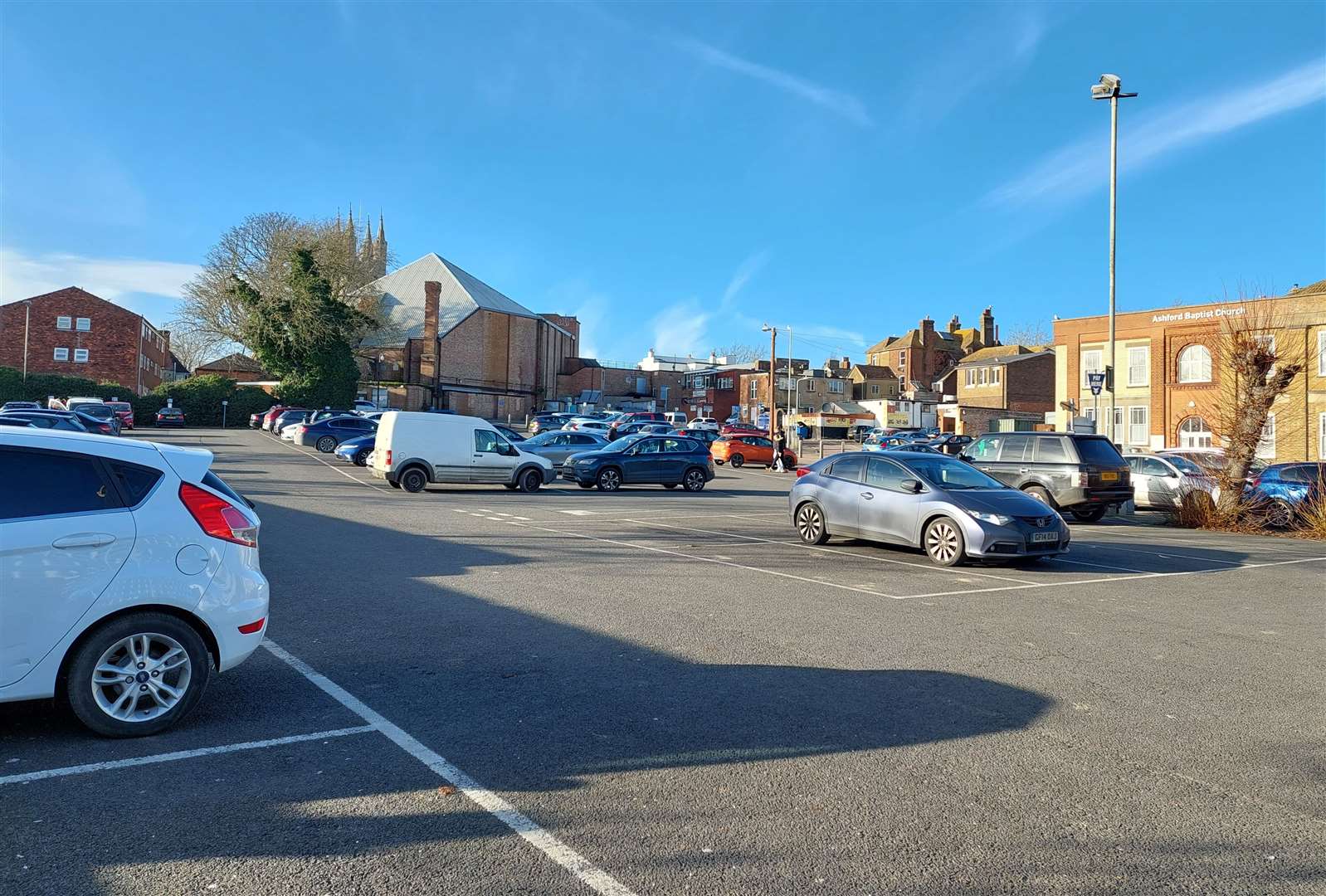 A boy was repeatedly punched in a robbery in Vicarage Lane car park in Ashford