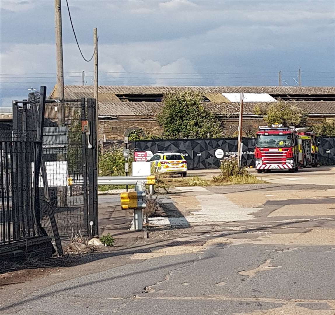 Two fire engines and a police car were seen outside the Railway Works on Newtown Road (14430480)