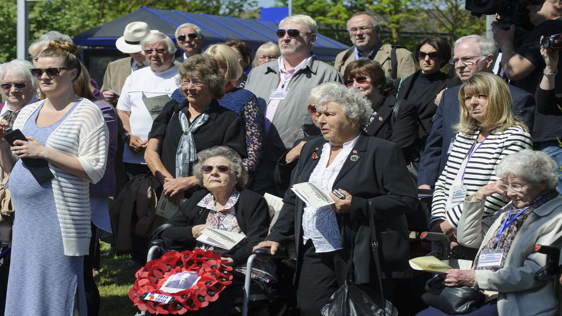 Members of the public, including families of those killed, at the memorial service.
