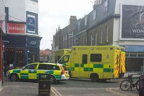 Ambulances formed a protective ring in Mortimer Street as they tried to help the man