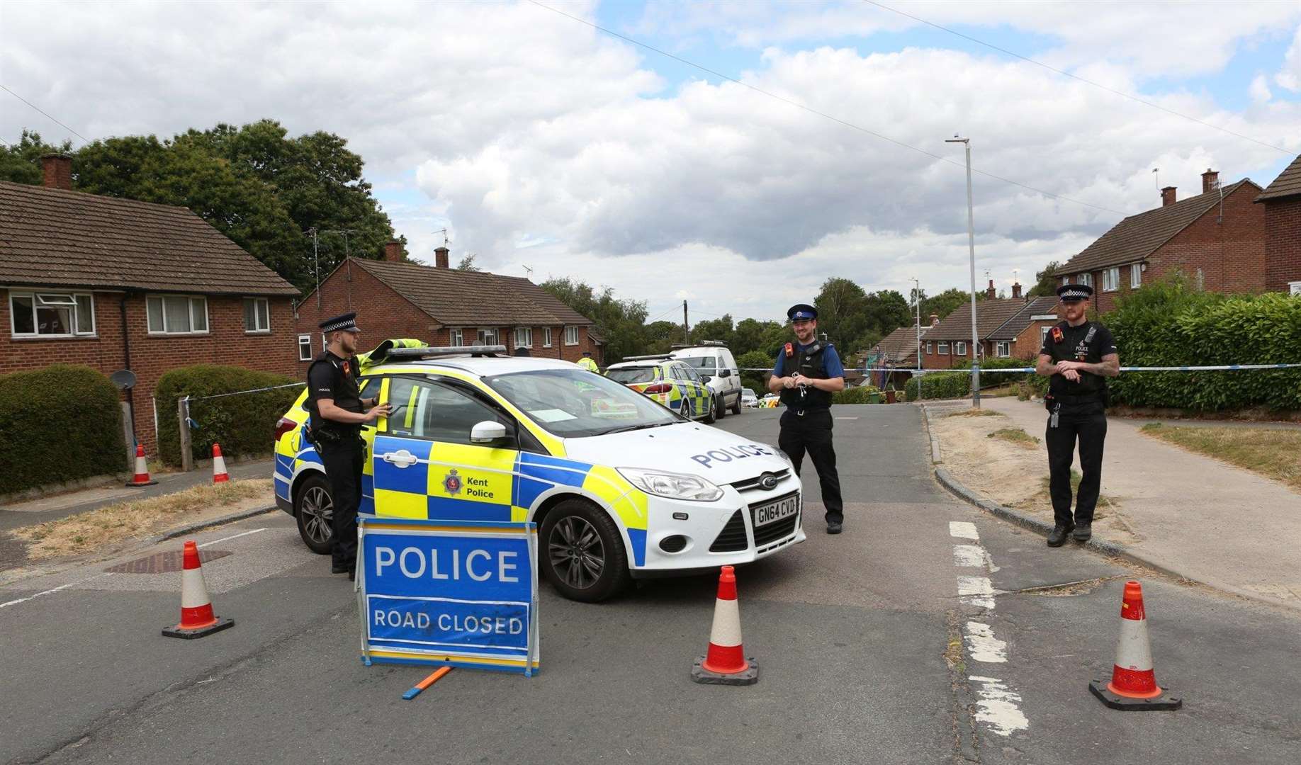 Police on Sherwood Road when Mr Farnes was killed in July. Picture: UK News in Pictures