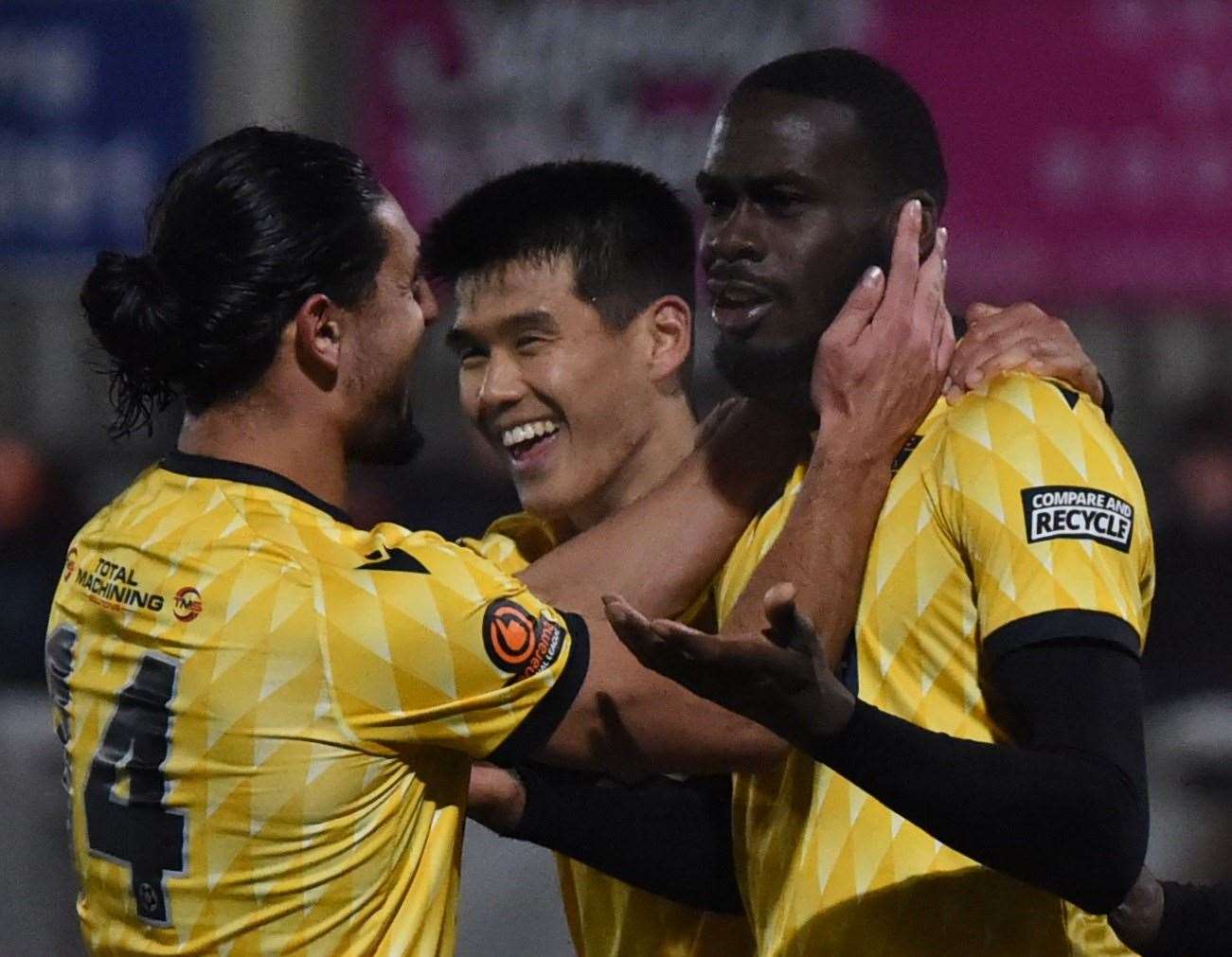 Levi Amantchi, right, celebrates his second goal with Harry Kyprianou (No.14) and Bivesh Gurung. Picture: Steve Terrell