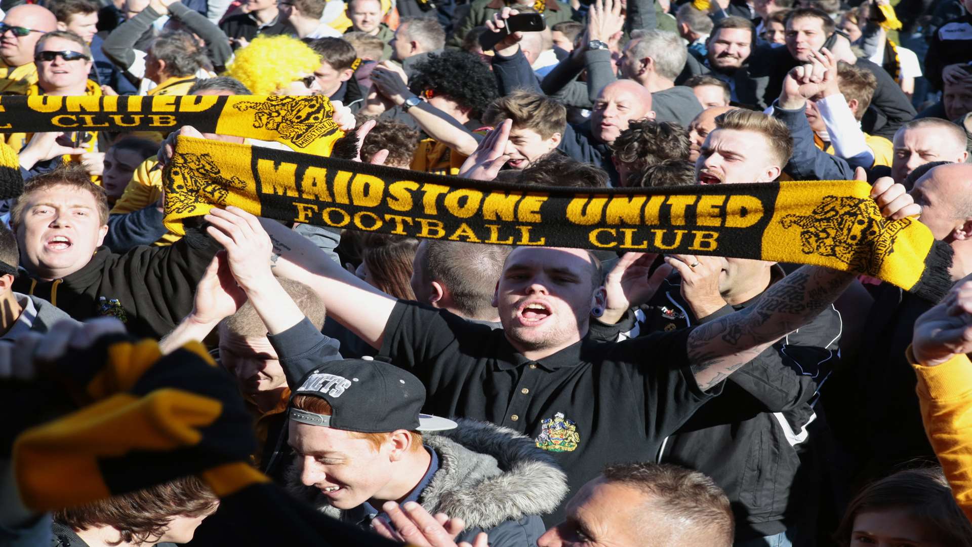 Maidstone fans celebrate promotion to Conference South. Picture: Martin Apps