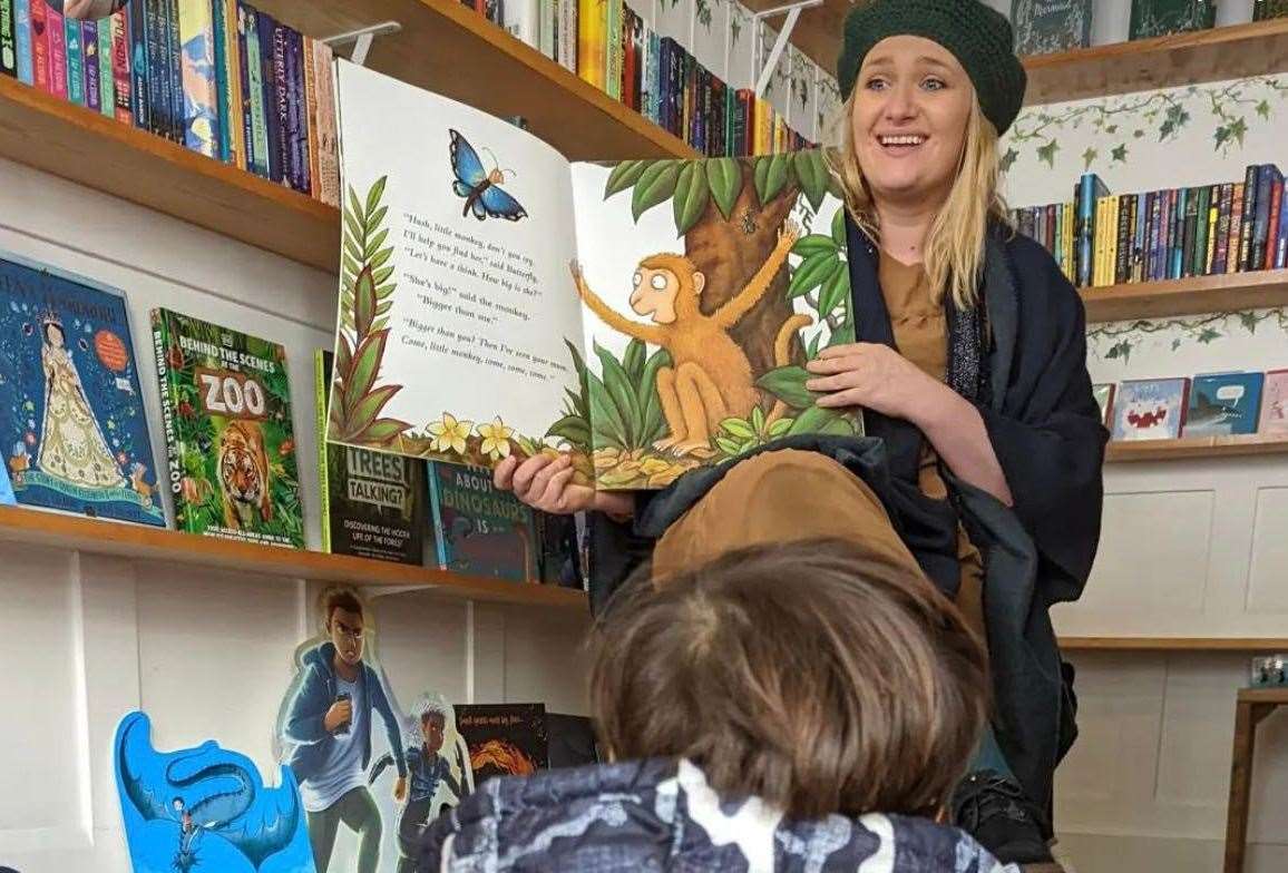 The Book Den owner Harriett Evans during a story time session at the shop in Hythe