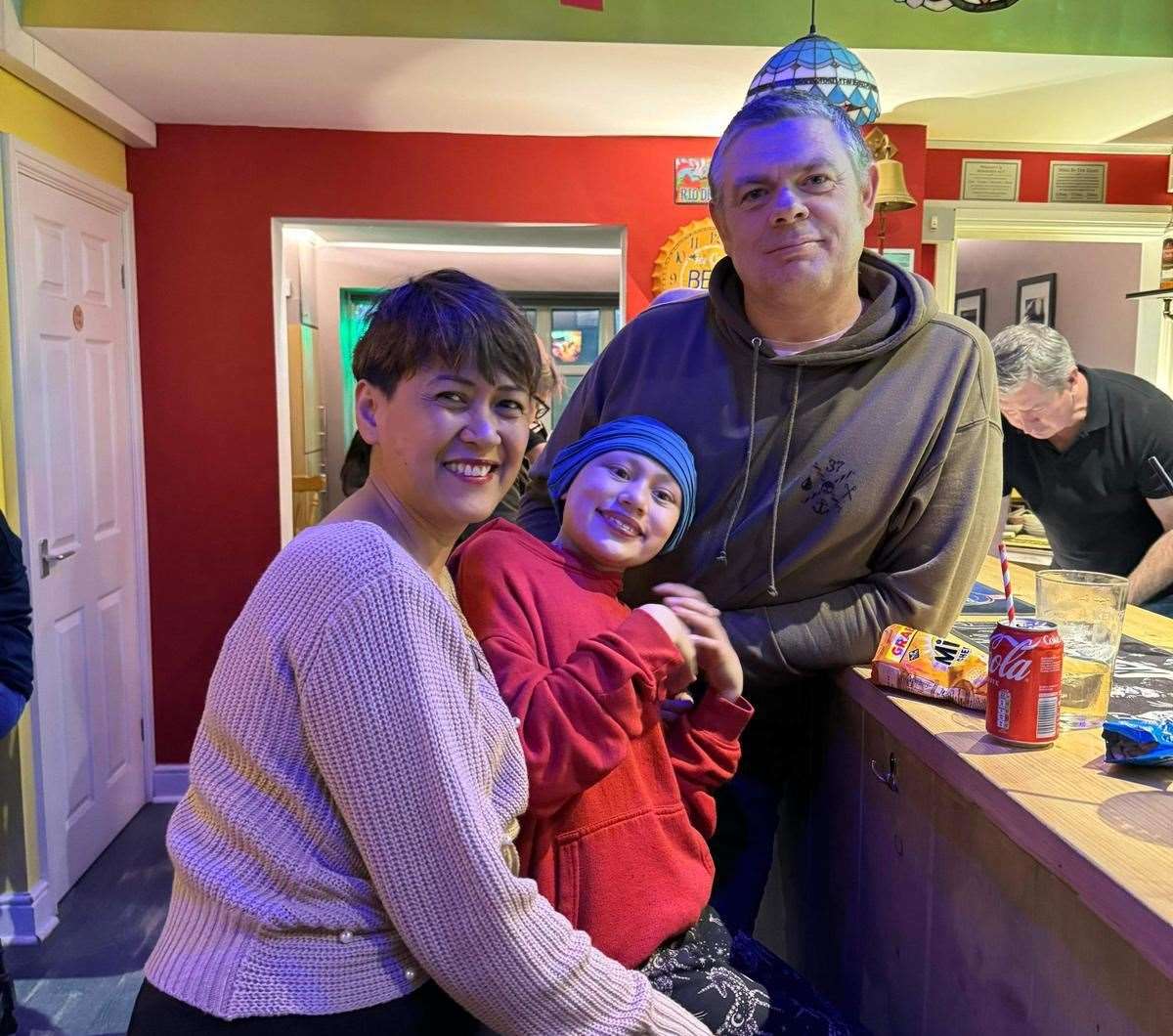 The youngster with her dad Terry and mum Dellanie