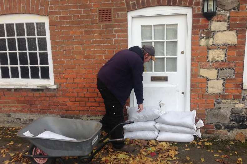 Homes are sandbagged in Sandwich ahead of the expected tidal surge