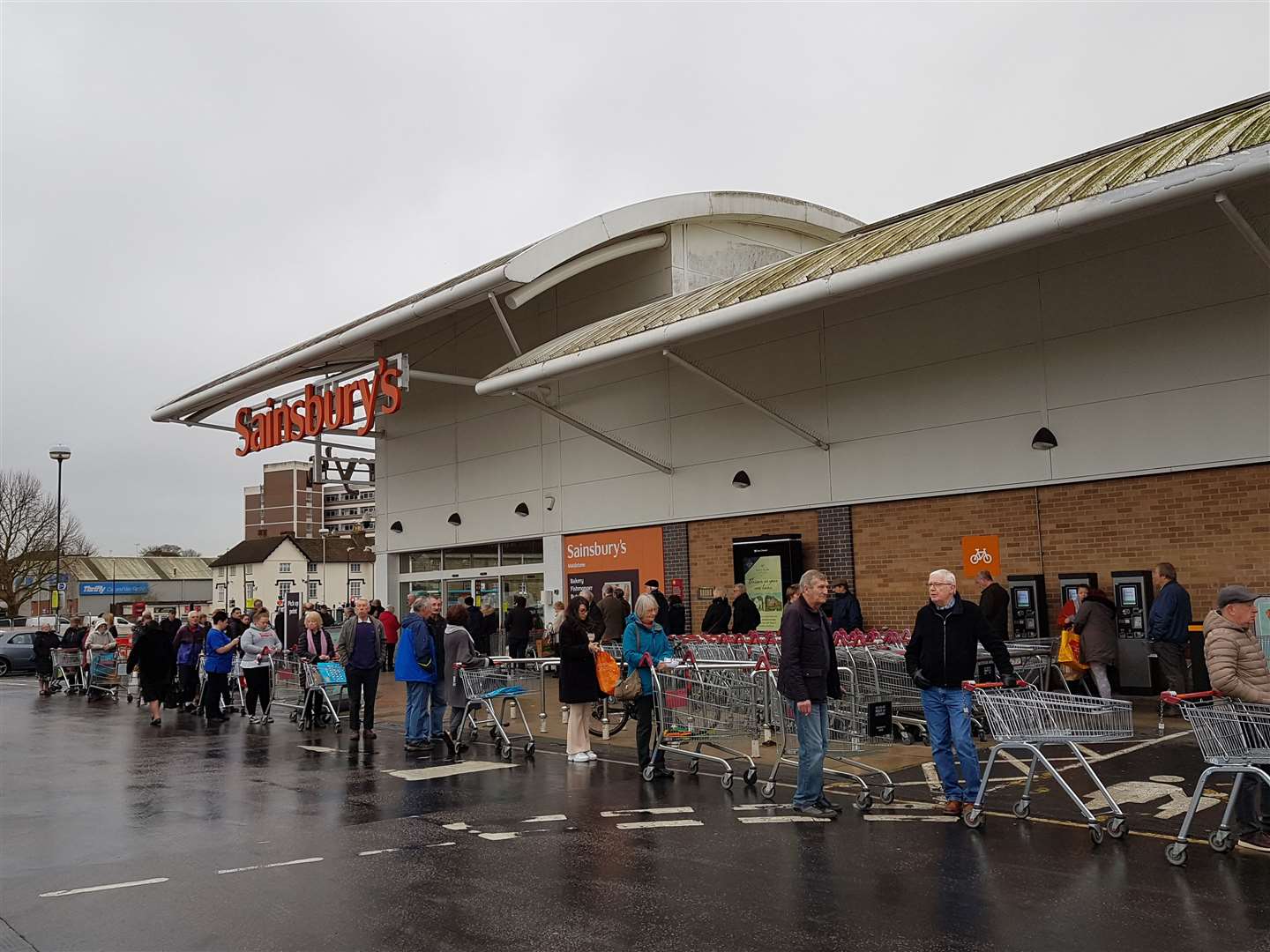 Queues outside Sainsbury's in Maidstone during a dedicated shopping slot for the elderly