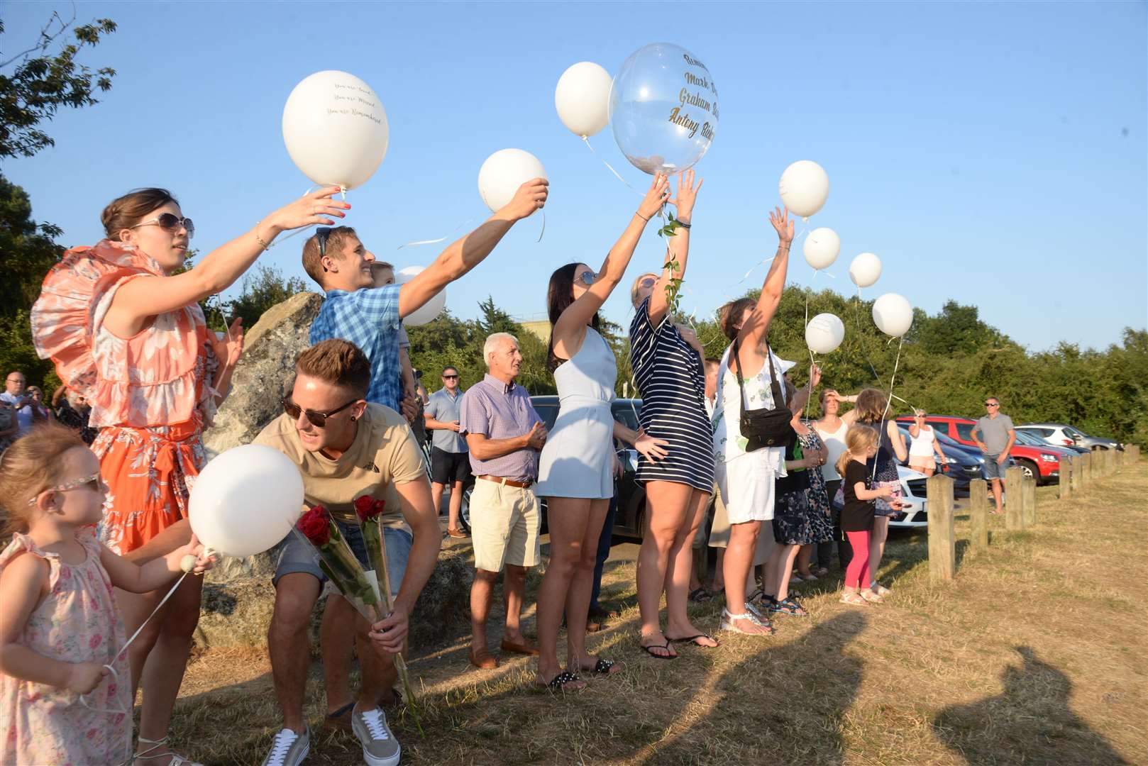 The balloon release at the memorial to the air ambulance crew who crashed 20-years ago at Bluebell Hill on Thursday. Picture: Chris Davey. (3303973)