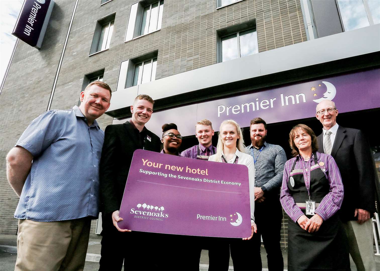 Sevenoaks council leader Peter Fleming with the team behind the new Premier Inn in Sevenoaks. The authority funded the building of the hotel