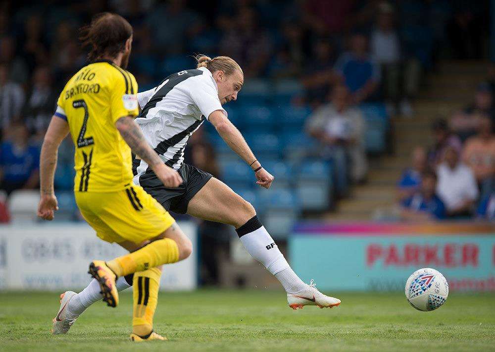 Gillingham striker Tom Eaves in action against Burton Albion Picture: Ady Kerry