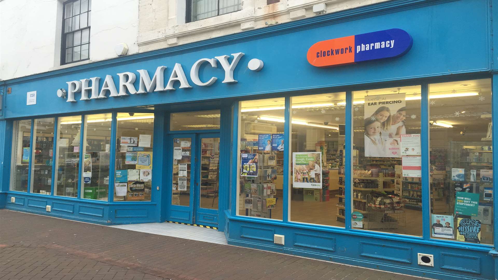 Police called to reports of a burglary at this pharmacy found two men inside