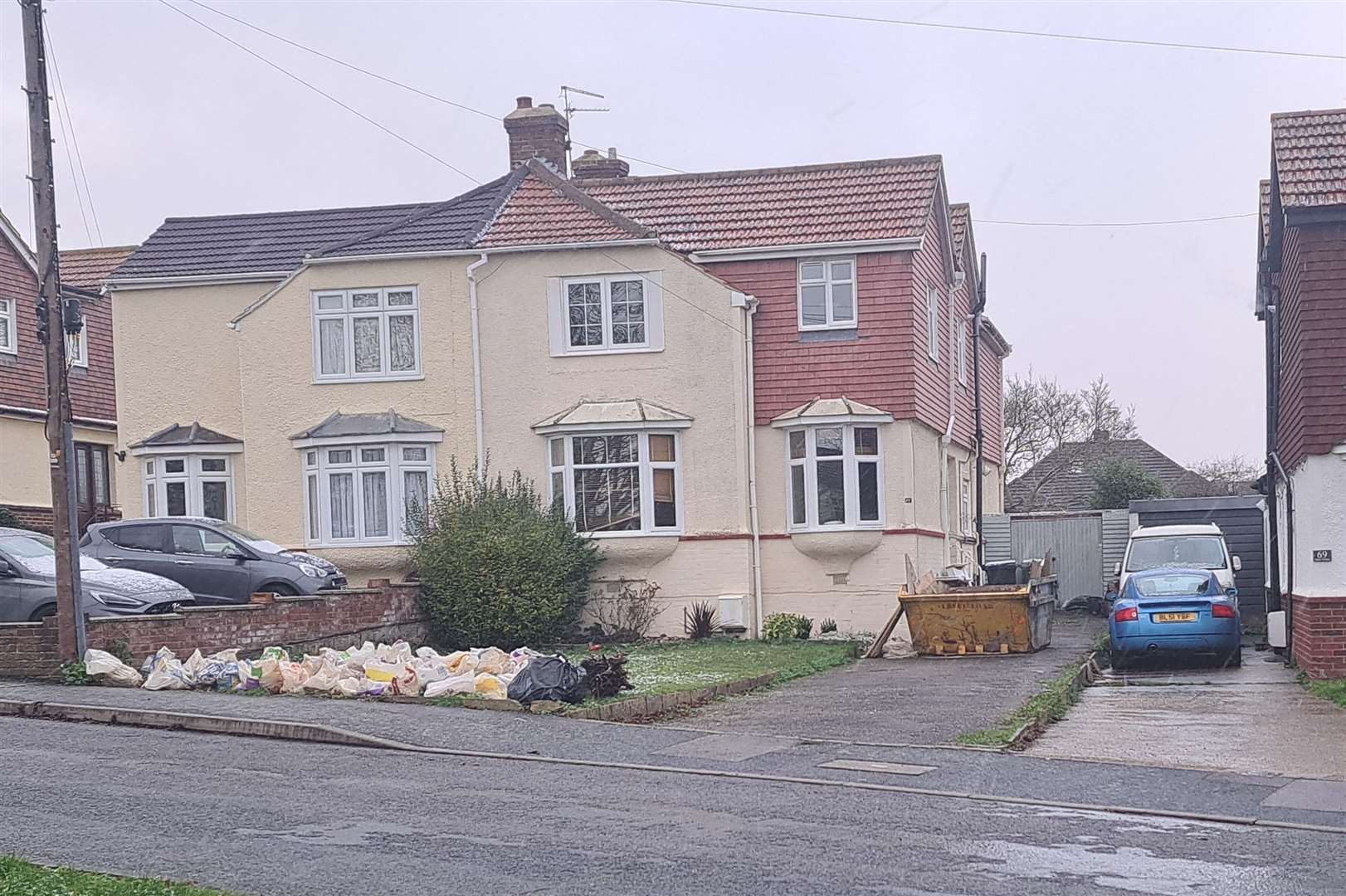 The house with the skip in the yard is the one earmarked for a children's home