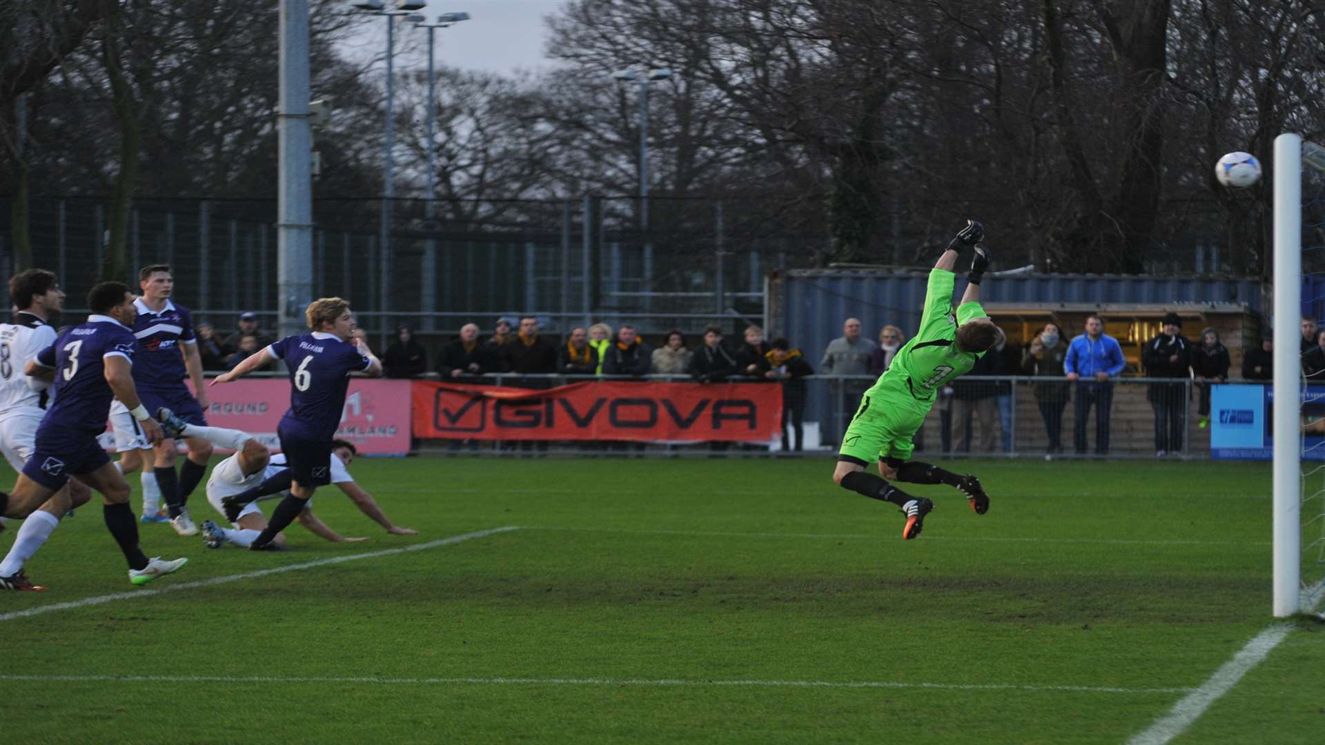 Jay May's header is pushed on to the bar by Margate keeper Chris Lewington on Boxing Day Picture: Steve Terrell