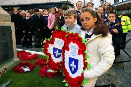 Chloe Maune and Dillon Stanley, both 10, from Diocesan and Payne Smith School, who laid wreaths at the war memorial in the Buttermarket, Canterbury