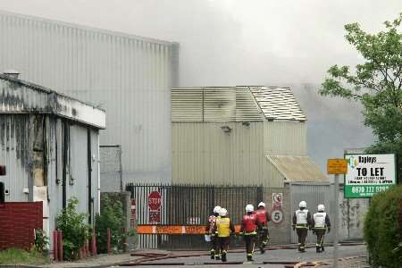 The dramatic fire sent black smoke billowing into the air. Picture: RICHARD EATON