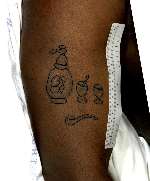 Police hope people will recognise these tattoos