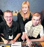 Sam and mum Sharon with kmfm presenter Johnny Lewis