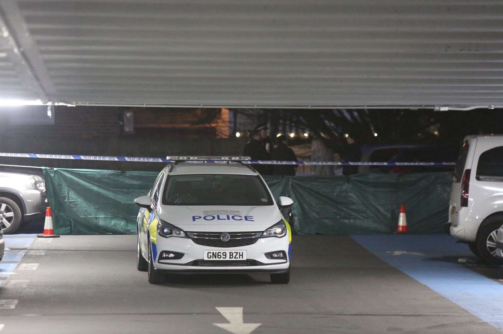Police have cordoned off the car park. Picture: UKNIP