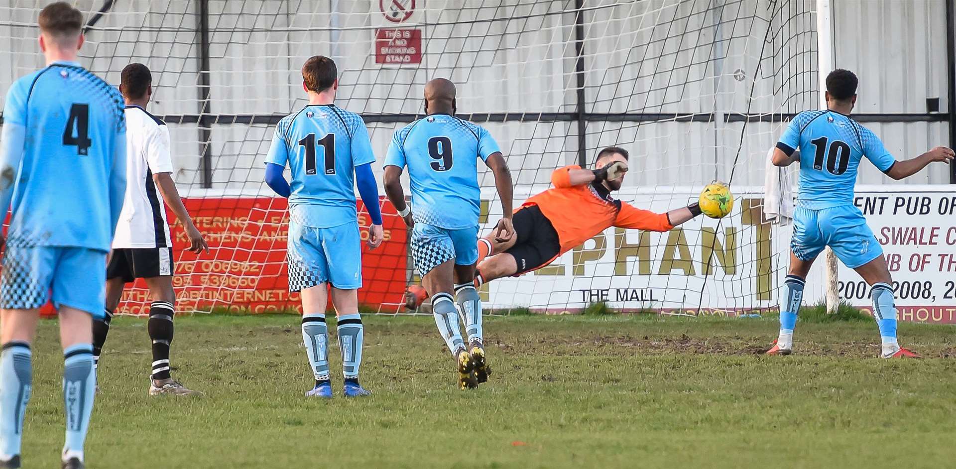 Faversham keeper Luke Watkins saves a penalty against Cray Valley Picture: Alan Langley