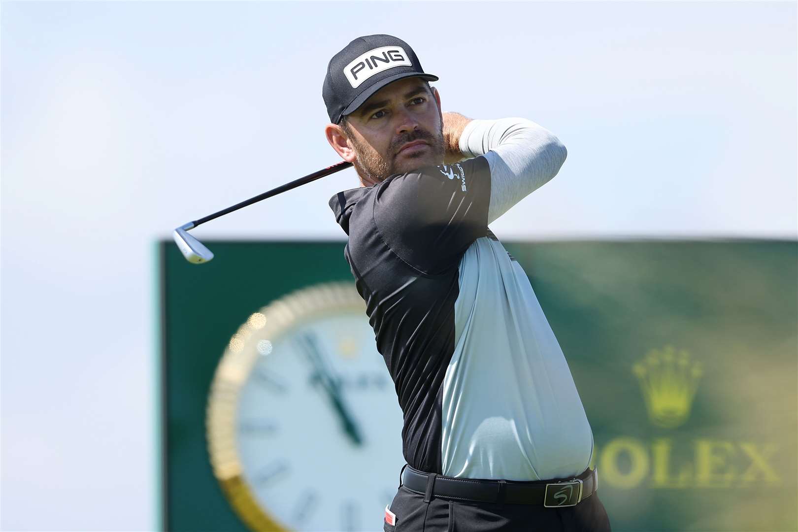 Louis Oosthuizen of South Africa tees off on the 5th hole and was in the lead at the end of Day One. Photo by Warren Little/R&A/R&A via Getty Images
