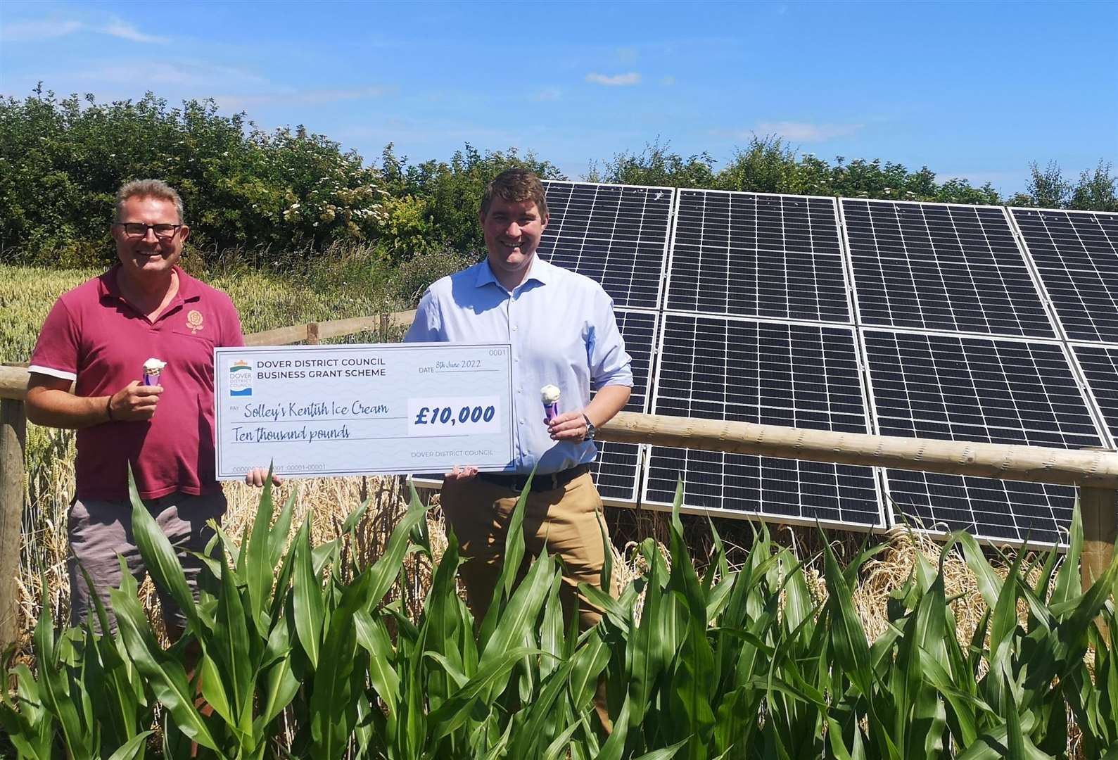 Cllr Chris Vinson presents Green Energy Grant cheque to Solley's Keith Morrison. Picture: DDC