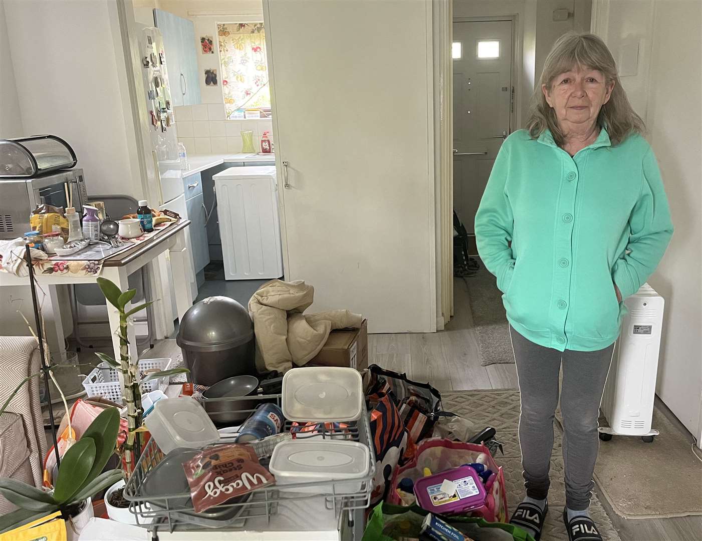 Barbara Hasiuk was told the mouldy kitchen cupboards in her flat would be replaced in February, so she moved their contents into her living room, where they remain three months later