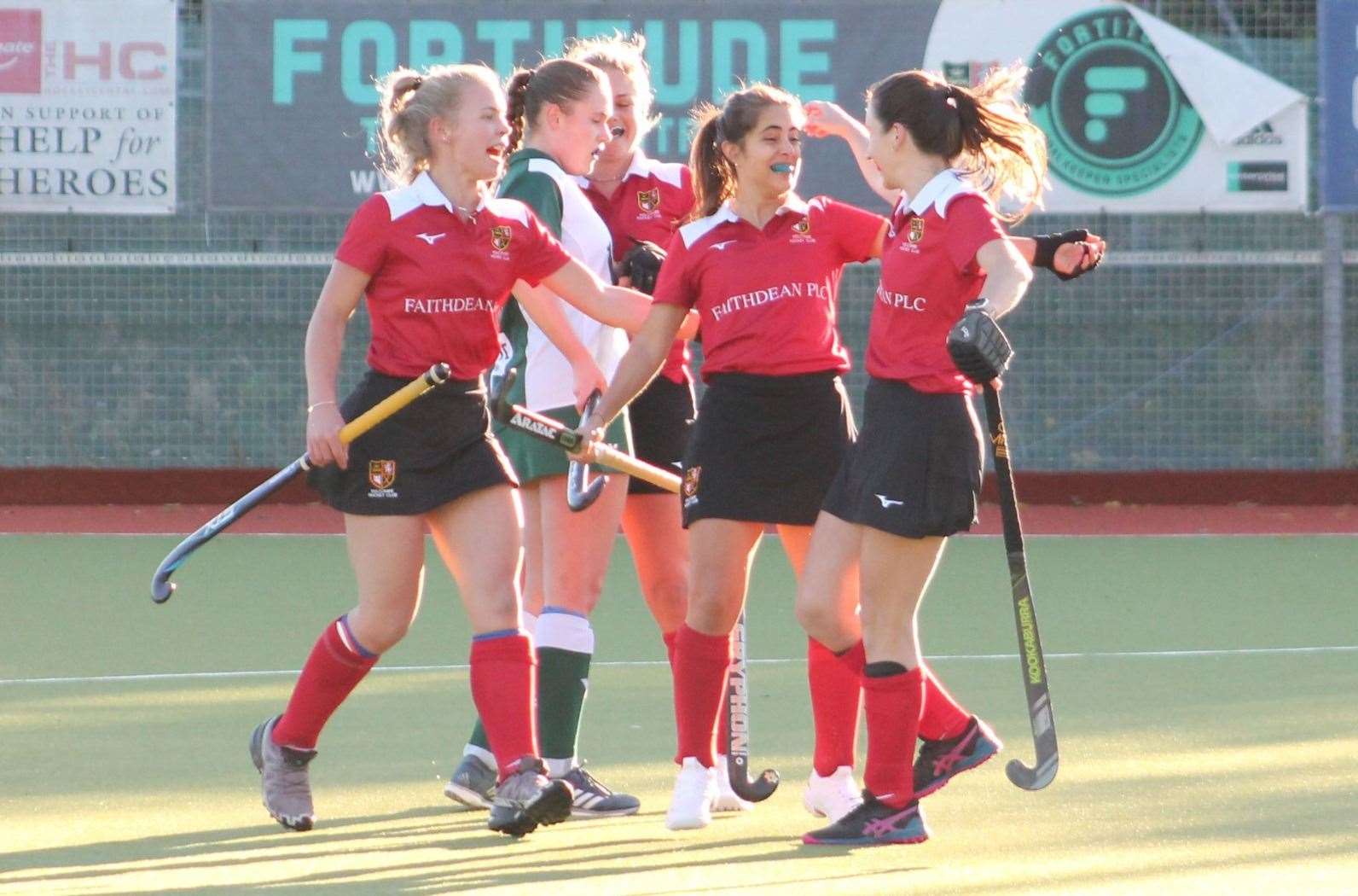 Holcombe celebrating a goal in their 7-1 win over Canterbury Picture: Holcombe Hockey Club / Becci Woodhead