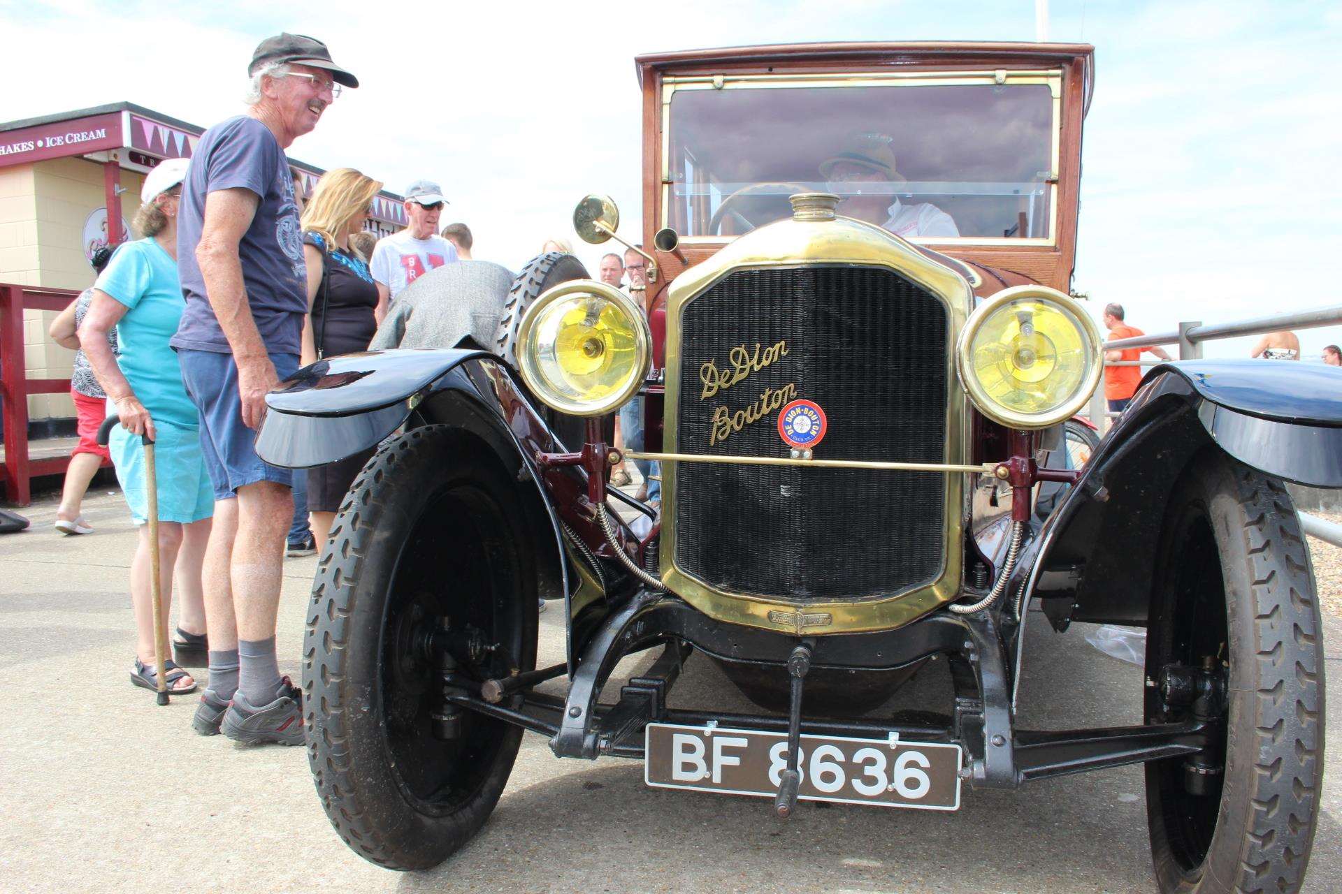 Car lovers inspect Paul Weeks' 1919 De Dion Bouton on the Sheppey seafront at Minster Leas on Sunday (3206554)