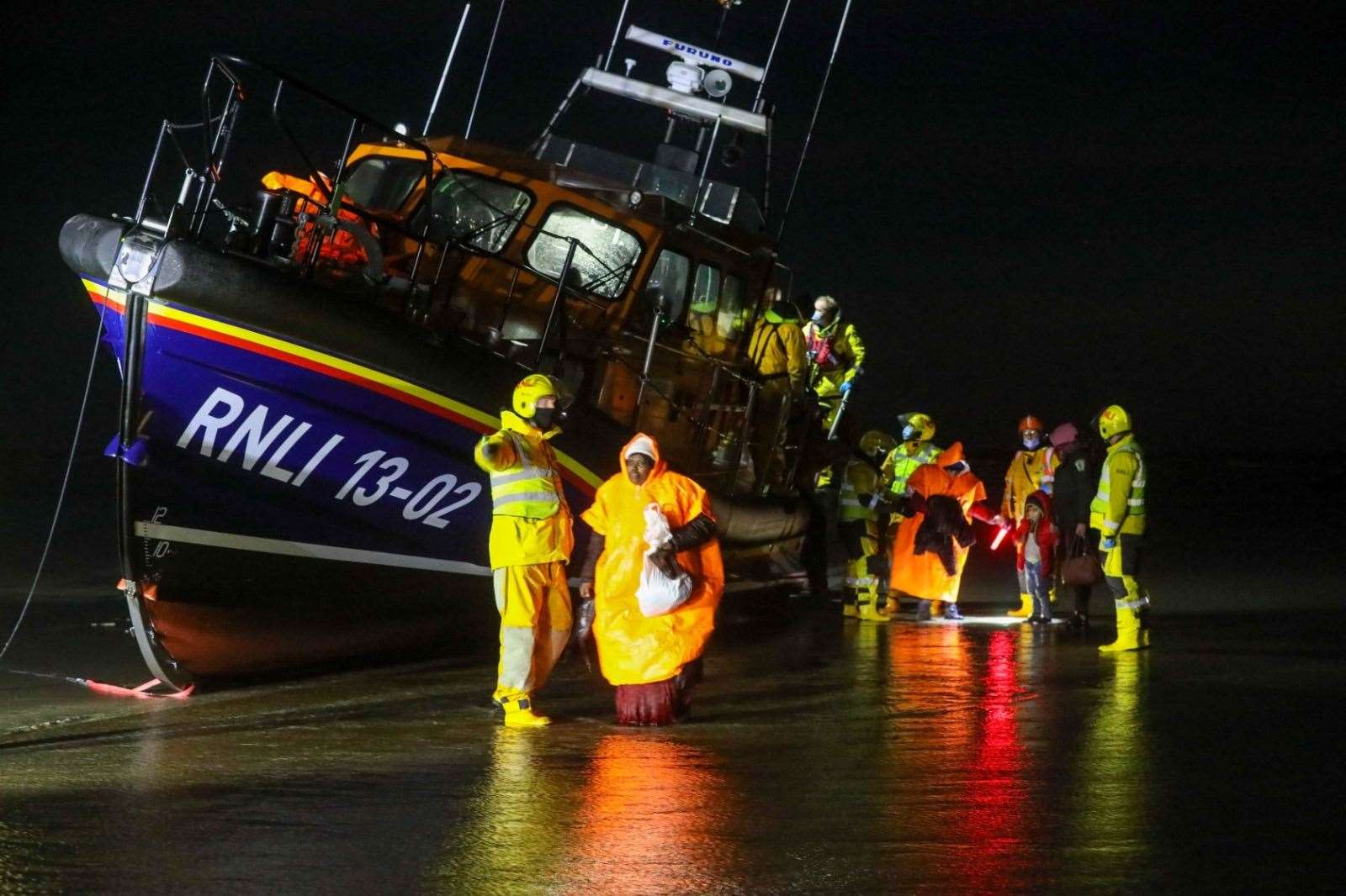 Asylum seekers including young children are rescued and land at Dungeness Picture: UKNIP